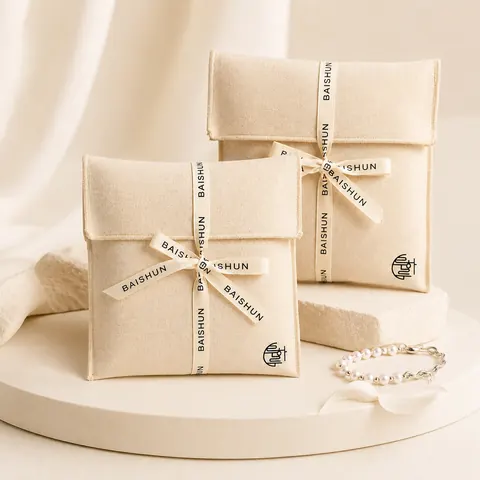Cross-Ribbon Fabric Envelope Pouch — product gallery view