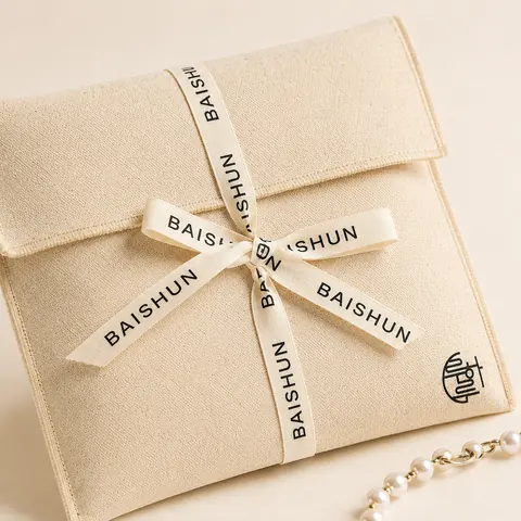 Cross-Ribbon Fabric Envelope Pouch — product gallery view
