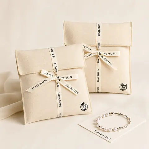 Cross-Ribbon Fabric Envelope Pouch — product gallery view