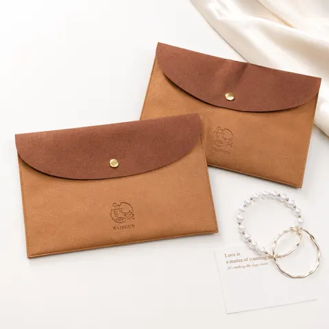 Suede-Look Snap Jewelry Pouch — product gallery view