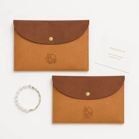 Suede-Look Snap Jewelry Pouch — product gallery view