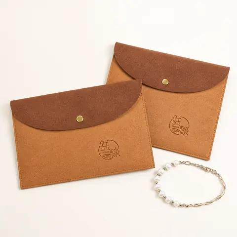 Suede-Look Snap Jewelry Pouch — product gallery view
