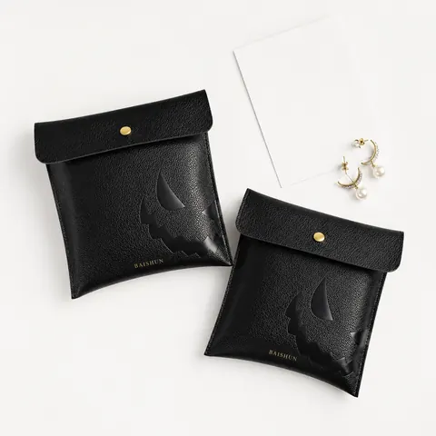 Black Leather-Look Cutout Jewelry Pouch — product gallery view