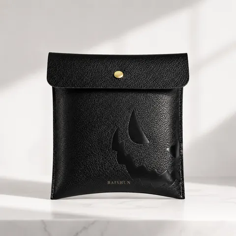 Black Leather-Look Cutout Jewelry Pouch — product gallery view