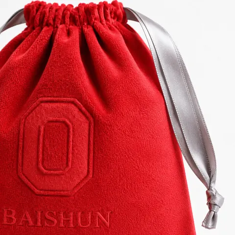 Red Embossed Velvet-Look Drawstring Pouch — product gallery view