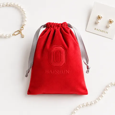 Red Embossed Velvet-Look Drawstring Pouch — product gallery view