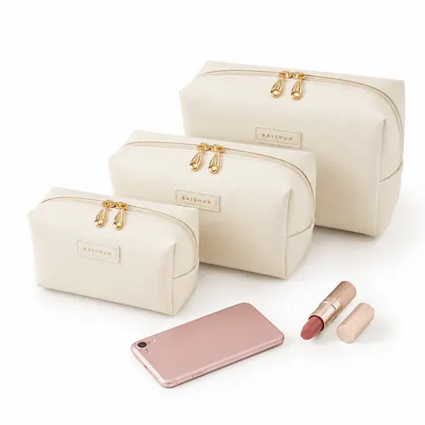 Handled Quilted Cosmetic Bag — product gallery view