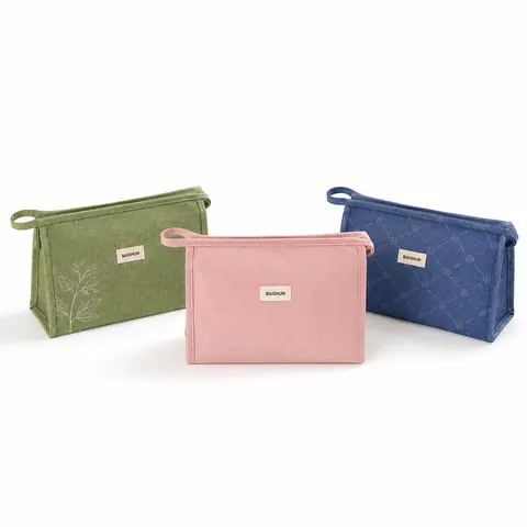 Handled Quilted Cosmetic Bag — product gallery view