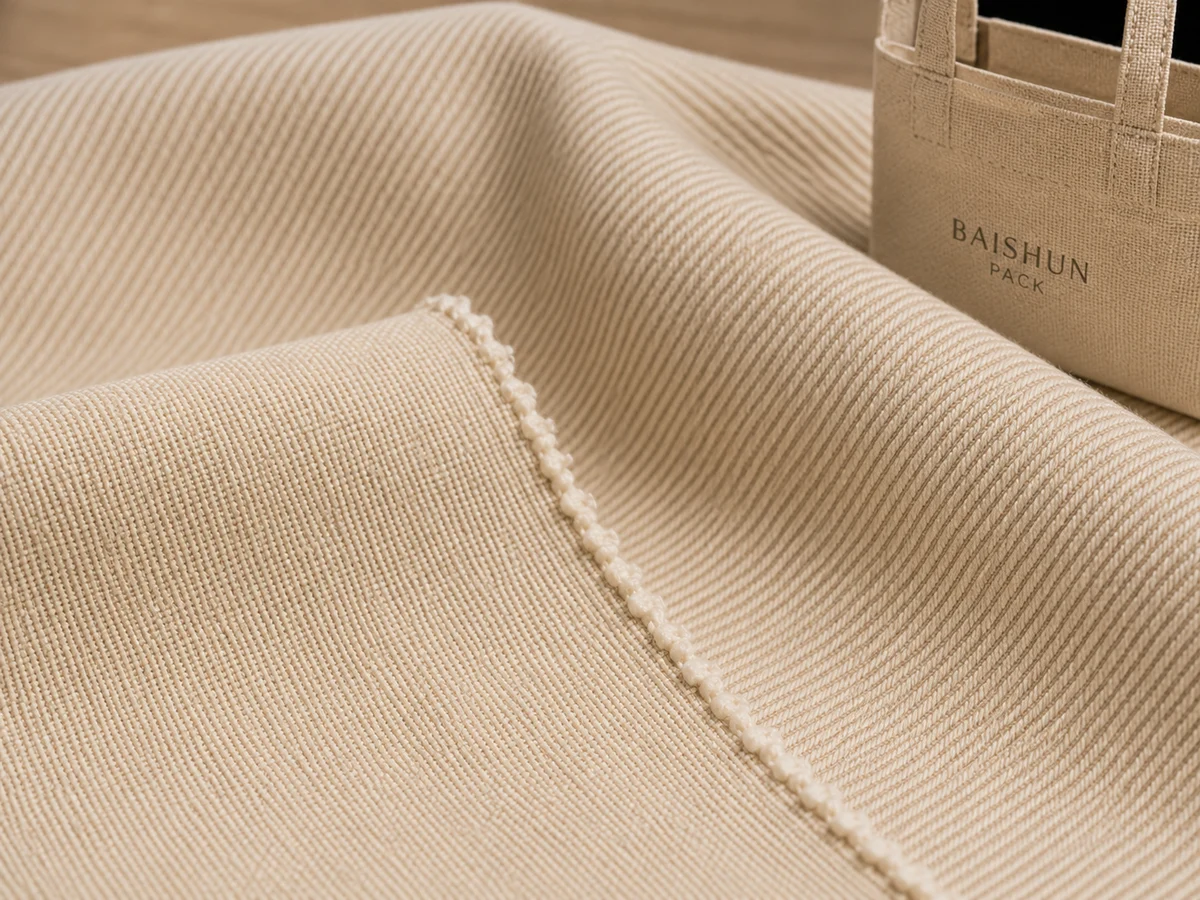 Cotton canvas beside diagonal-weave twill, showing both textures